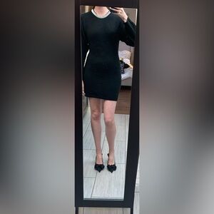 Black knit minidress with rhinestone neckline